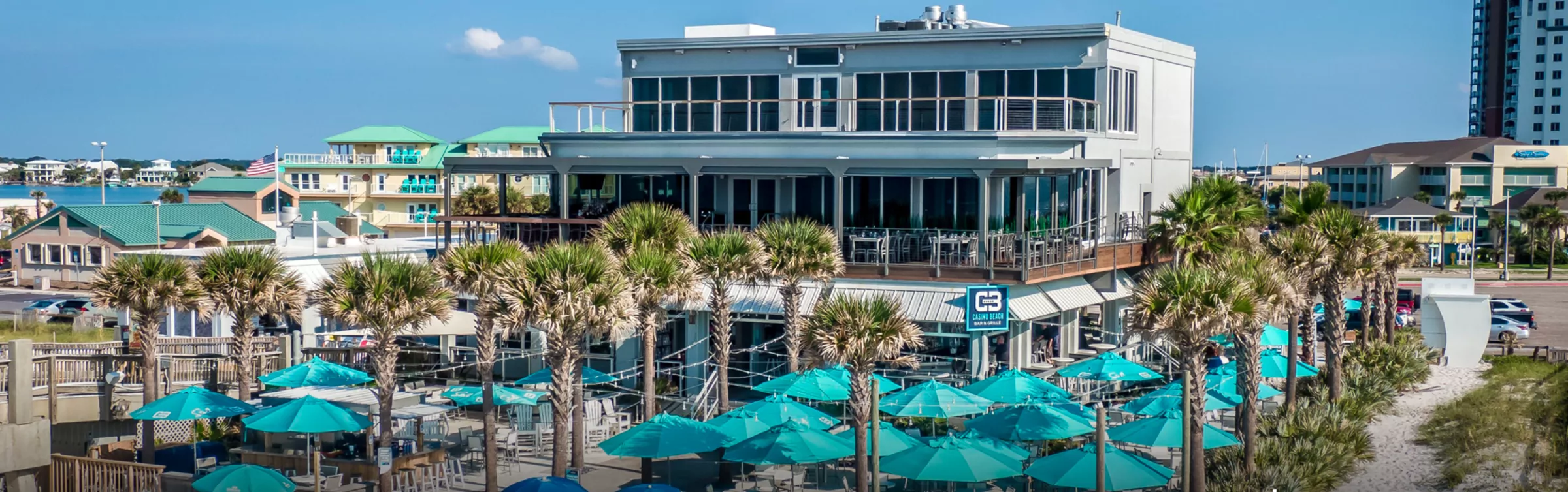 Casino Beach Bar & Grille — the building at the foot of the Pensacola Beach pier, with the monogram on its facade